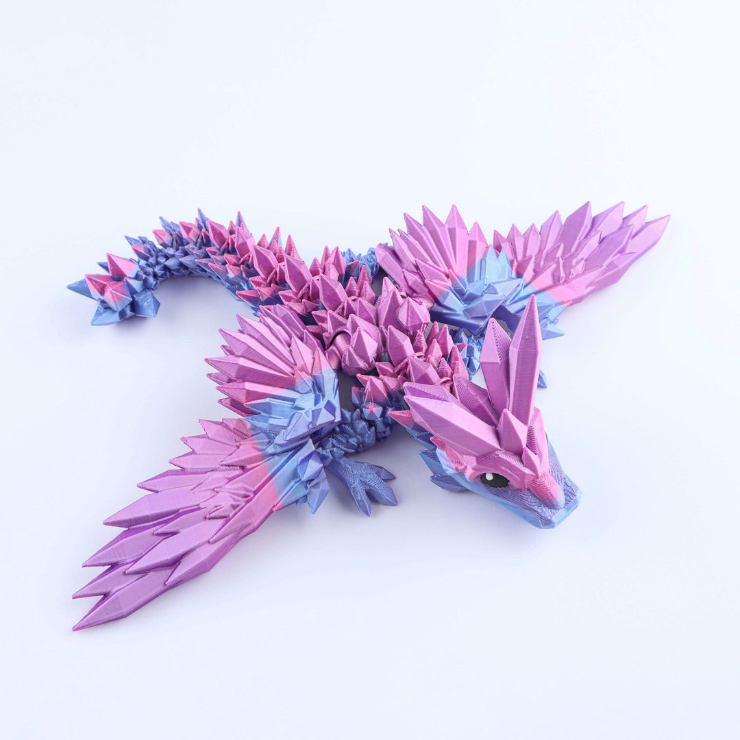 Colorful dragon-shaped toy on a white background
