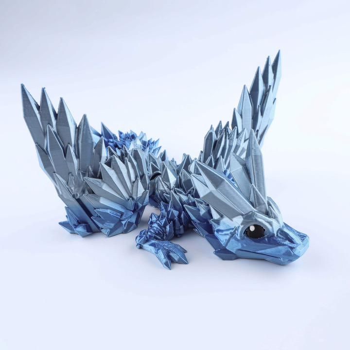Blue dragon figurine on a white background