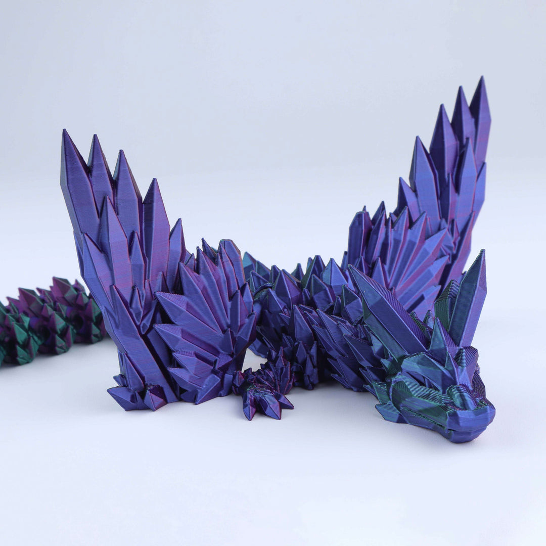 Purple dragon-like creature with sharp spikes on a white background