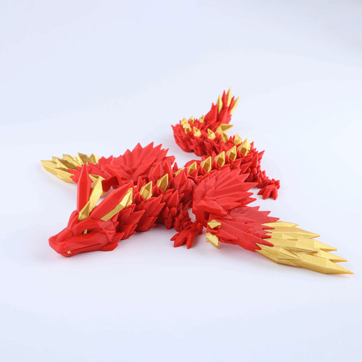 Red and gold dragon-like creature model on a white background