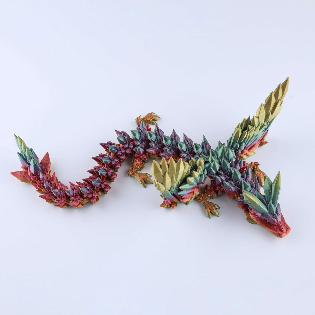 Colorful dragon-shaped sculpture on a white background