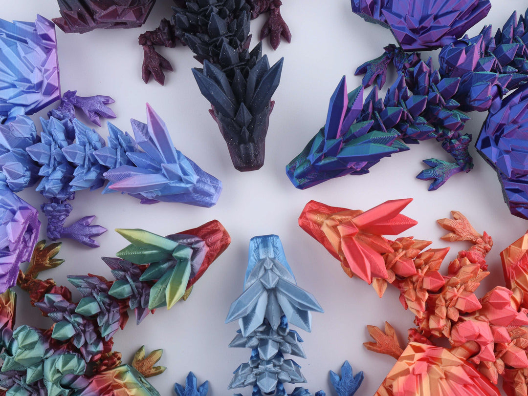 Colorful dragon-shaped objects on a white background
