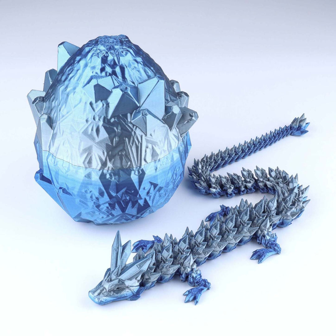 Blue crystal dragon egg and dragon on a white background