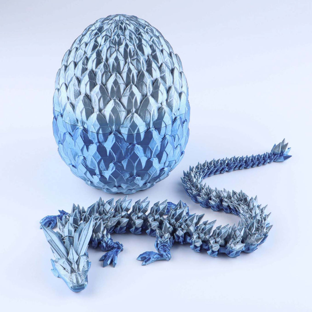 Blue dragon egg and dragon model on a white background