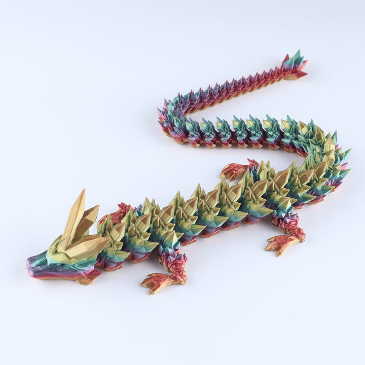 Colorful dragon-shaped toy on a white background