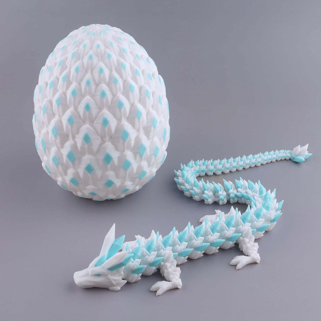 White and blue dragon egg with a dragon model on a gray background
