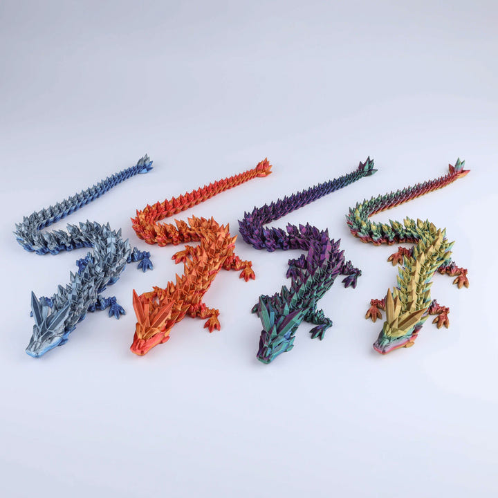 Colorful dragon-shaped toys on a white background