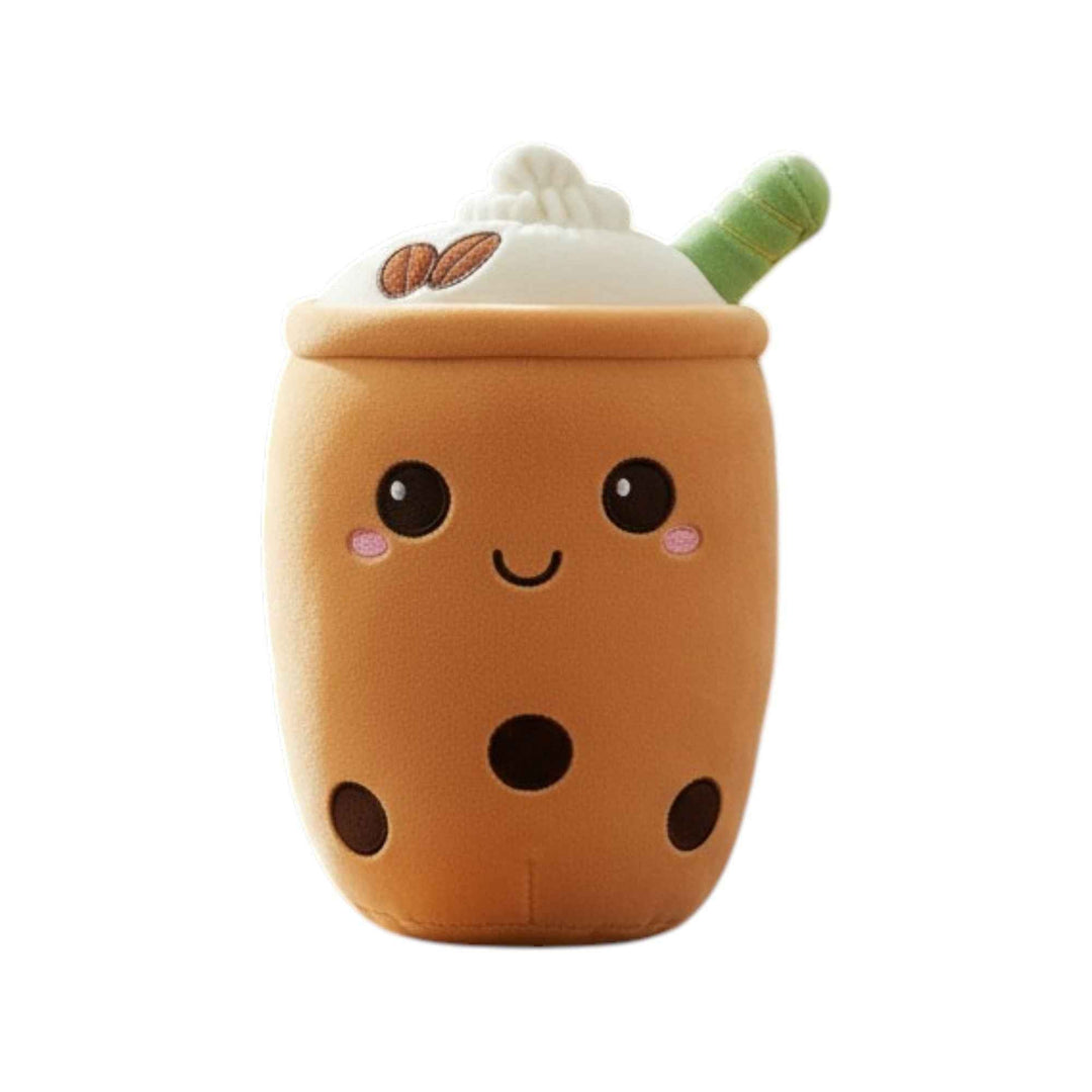 A cute, kawaii-style boba drink character toy or plush. It features a warm brown body with black bubble details, a white whipped cream top with two brown coffee beans, and a green striped straw.